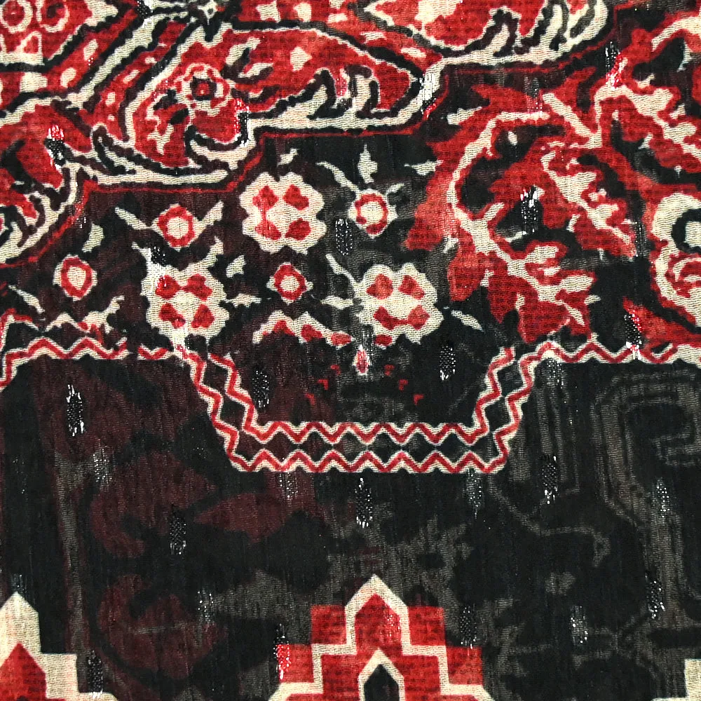 Mousseline imprimée plumetis lurex ornement rouge fond noir